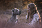 woman and American Staffordshire Terrier