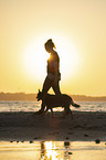 woman and Australian Cattle Dog