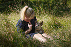 young woman with Australian Cattle Dog puppy