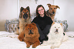 woman and 4 dogs