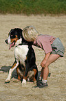 boy and Great Swiss Mountain Dog