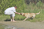 man with Labrador Retriever