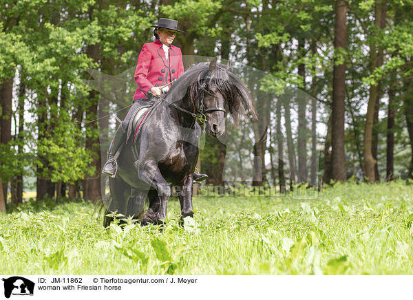 woman with Friesian horse / JM-11862
