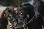 woman and 3 horses