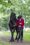 woman with Friesian horse