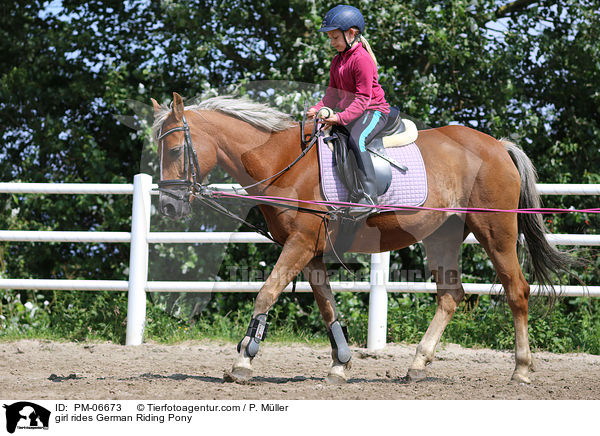 girl rides German Riding Pony / PM-06673