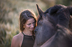 woman and holsteins horse