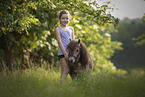 girl and Mini Shetland Pony
