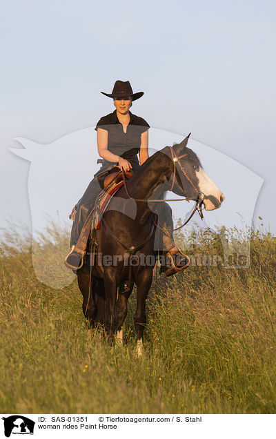 woman rides Paint Horse / SAS-01351