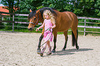 child and Quarter Pony
