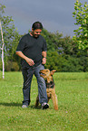 man and Airedale Terrier