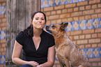 young woman with Australian Cattle Dog