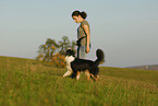 young woman with Australian Shepherd
