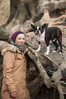 woman and Boston Terrier