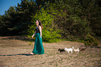 woman and longhaired Chihuahuas