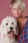 woman and Goldendoodle