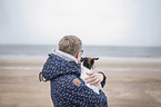 human with Jack Russell Terrier