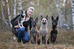 woman with 4 Dogs