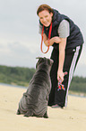 woman and young Shar Pei