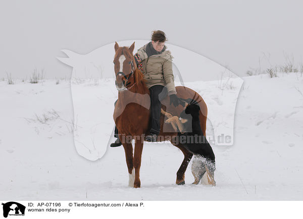 woman rides pony / AP-07196