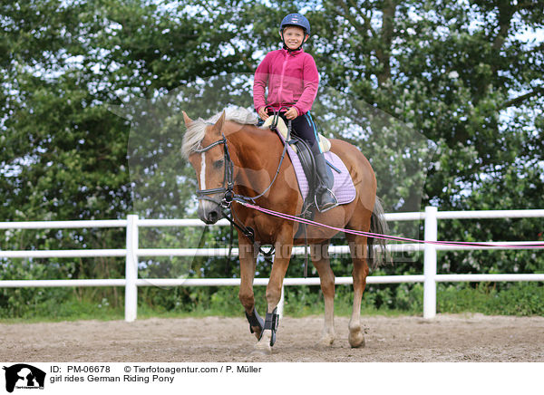 girl rides German Riding Pony / PM-06678