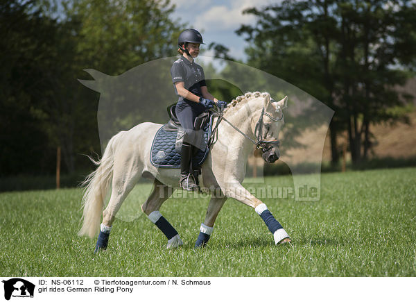girl rides German Riding Pony / NS-06112