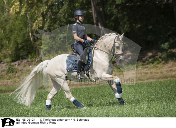 girl rides German Riding Pony / NS-06121