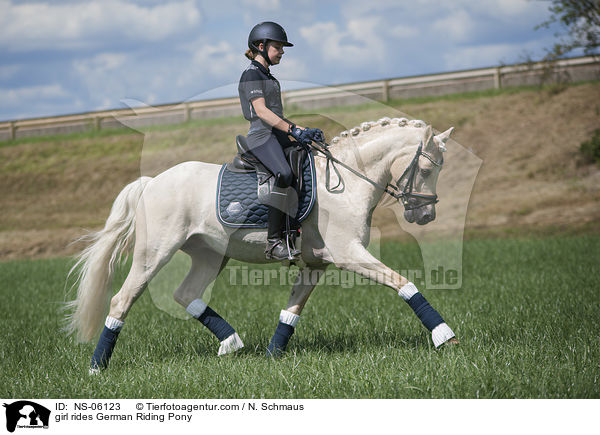 girl rides German Riding Pony / NS-06123