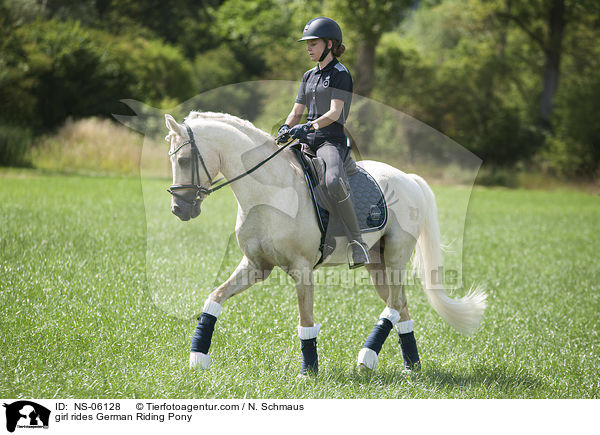 girl rides German Riding Pony / NS-06128