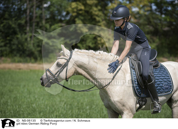 girl rides German Riding Pony / NS-06135
