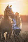 Haflinger with a woman