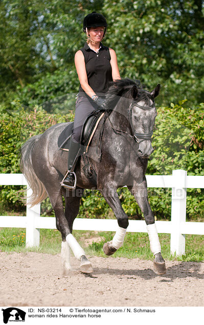 woman rides Hanoverian horse / NS-03214