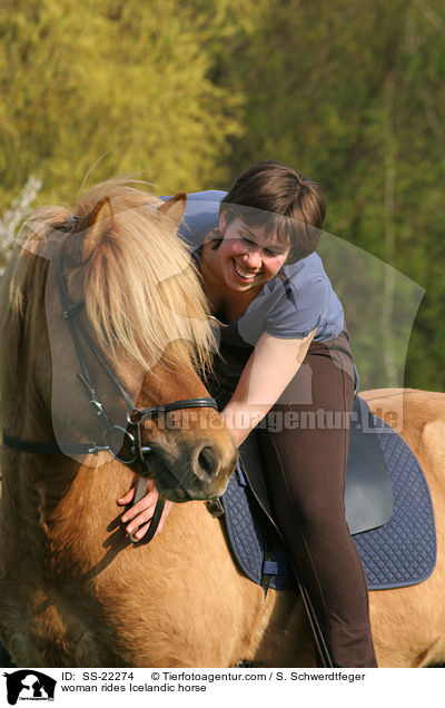 woman rides Icelandic horse / SS-22274