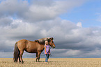 girl and Icelandic Horse