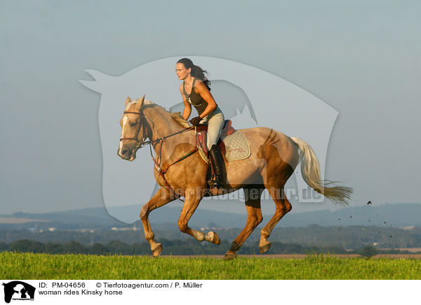 woman rides Kinsky horse / PM-04656