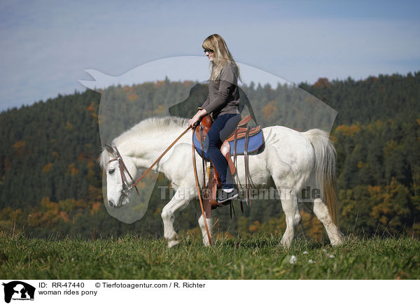 woman rides pony / RR-47440