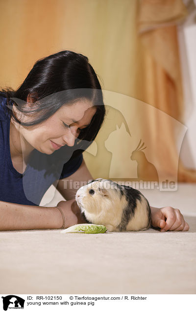 young woman with guinea pig / RR-102150