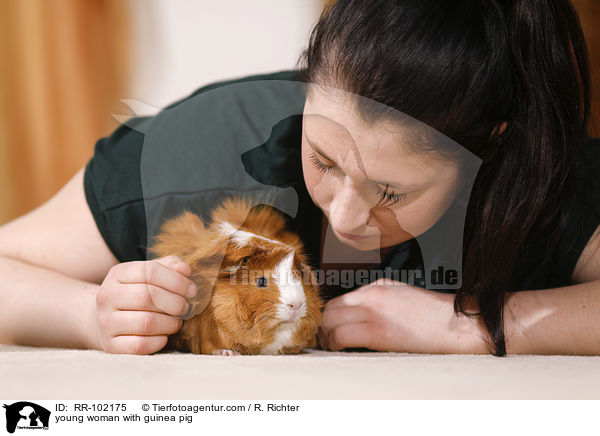 young woman with guinea pig / RR-102175