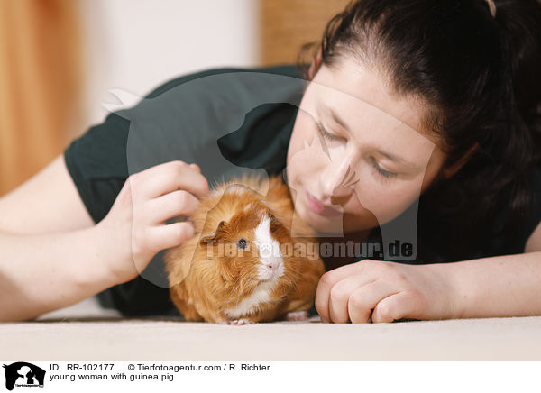 young woman with guinea pig / RR-102177
