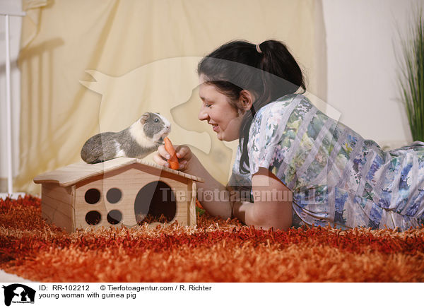 young woman with guinea pig / RR-102212