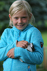 girl and guinea pig